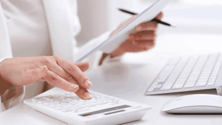 a woman using a calculator to calculate RVI