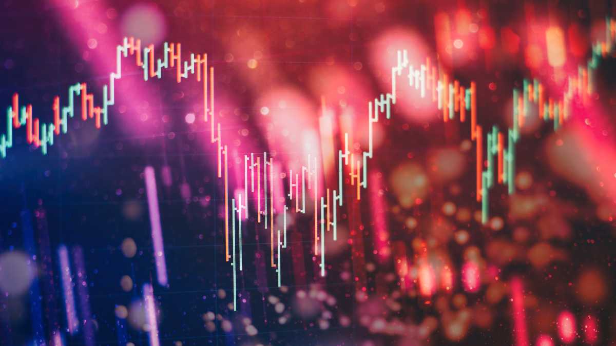 Stock market candlestick chart on a glowing background