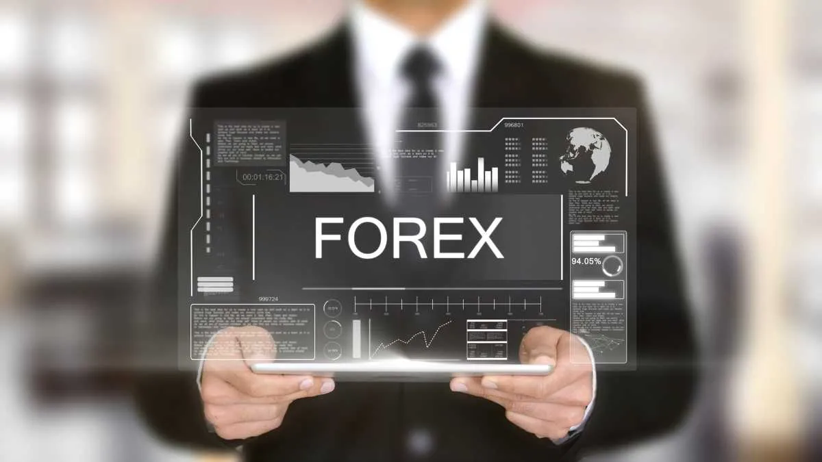 The image shows a man holding a hologram image with the word forex