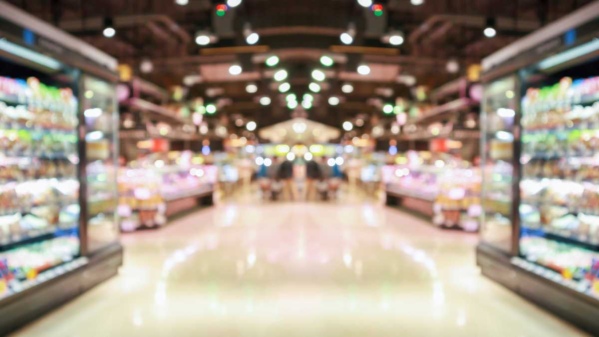 Blurred supermarket aisle view