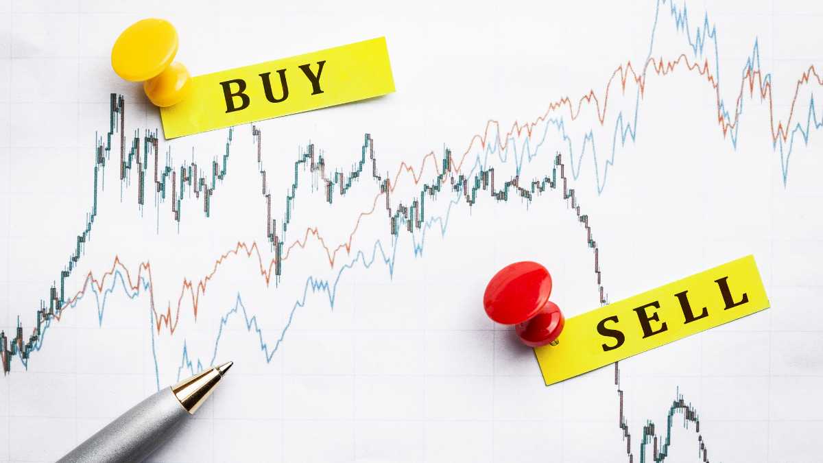 Stock market graph with BUY and SELL labels and a pen