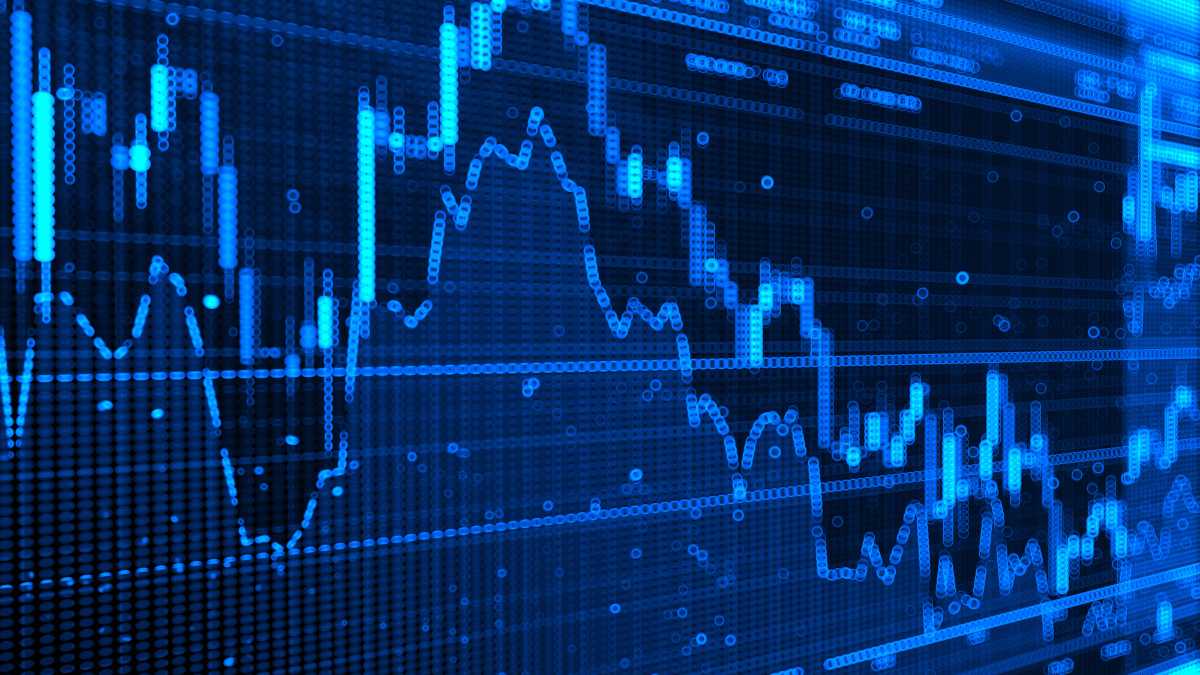 Digital stock market graph on a blue screen indicating financial data