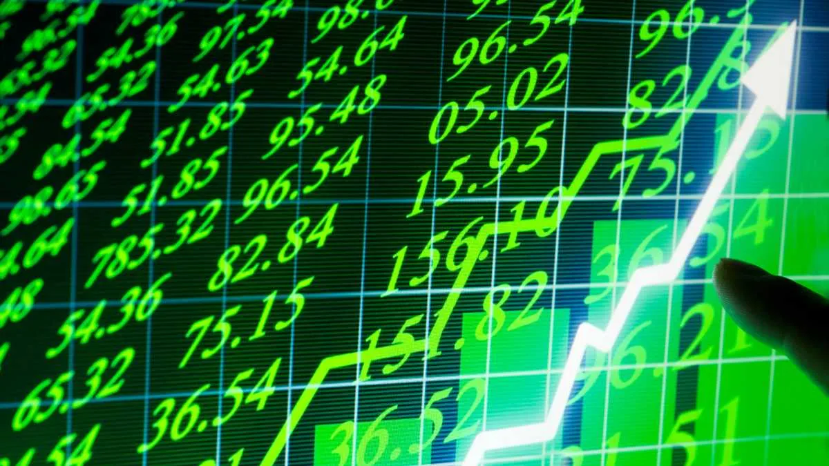 Stock market growth chart with upward trend and digital glow.