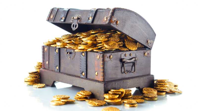 An open treasure chest filled with gold coins