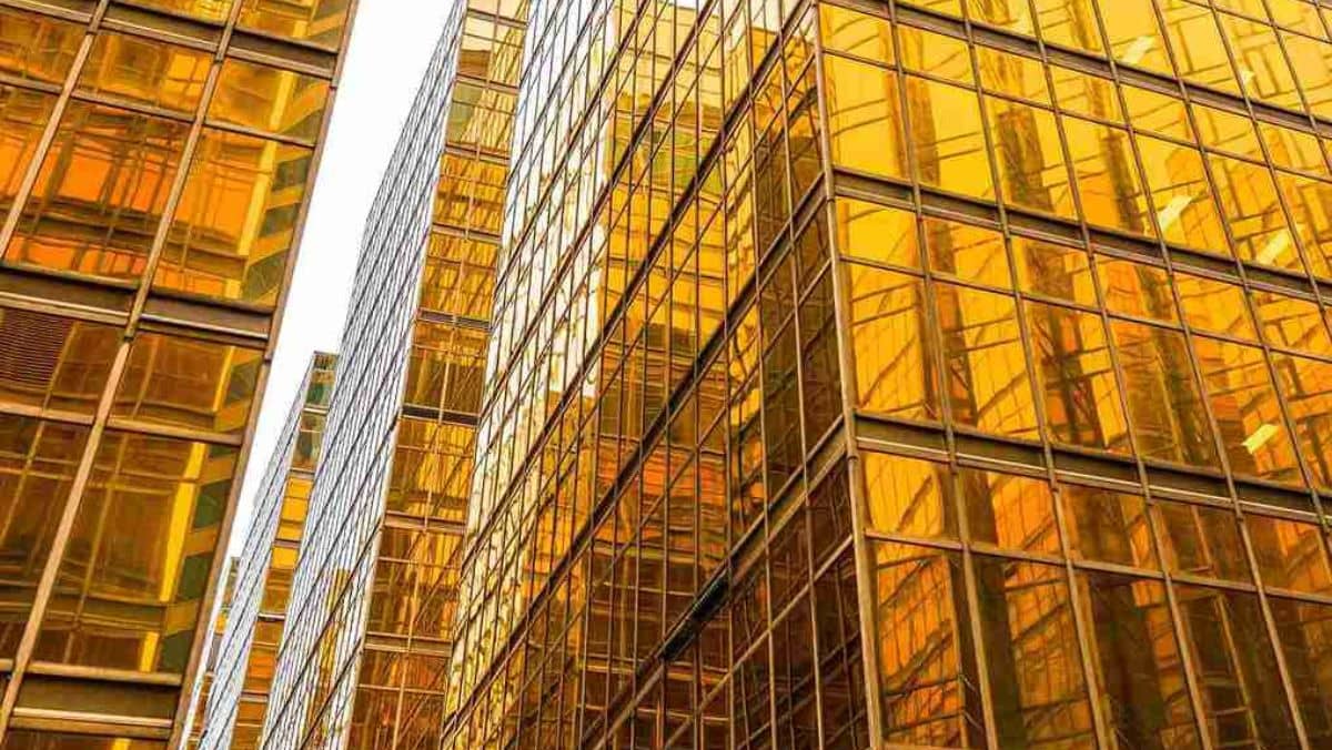 Building's windows sparkle with a lustrous golden tint