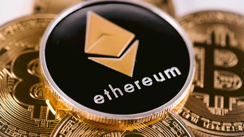 Ethereum coin on top of Bitcoin coins