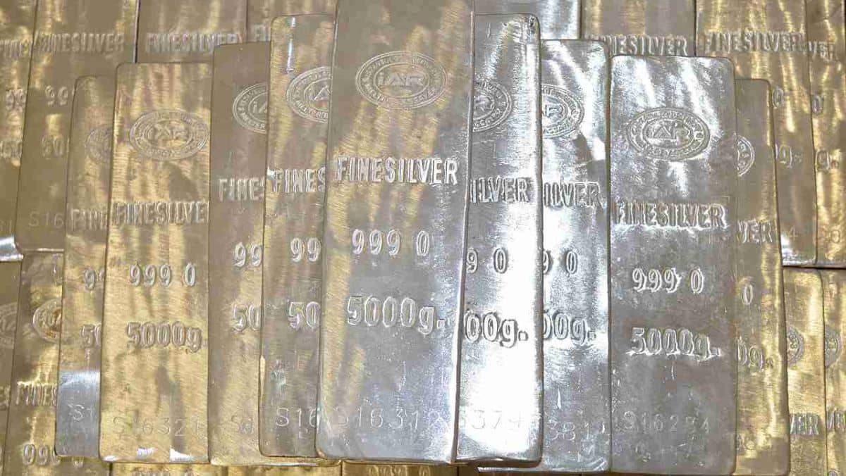 Fine silver bars labeled with their purity and weight specifications