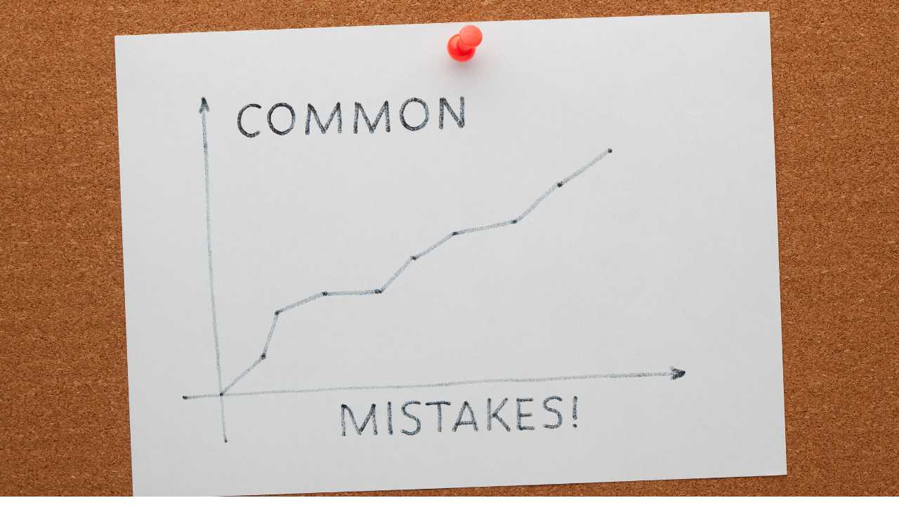 Graph on a note pinned to a board labeled COMMON MISTAKES