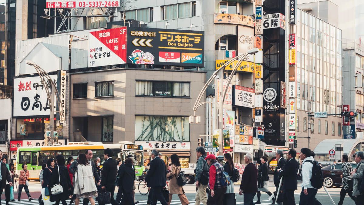 Japan signals end to ultra-loose policy as global stocks march higher.