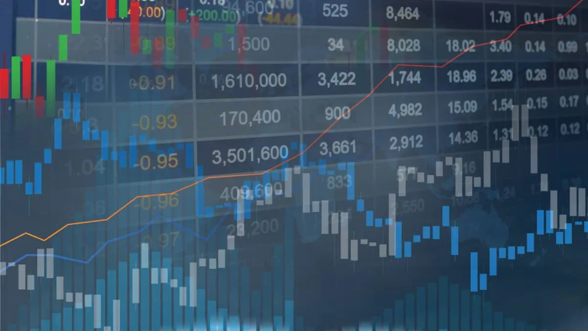 a trading chart and stock market data on the background