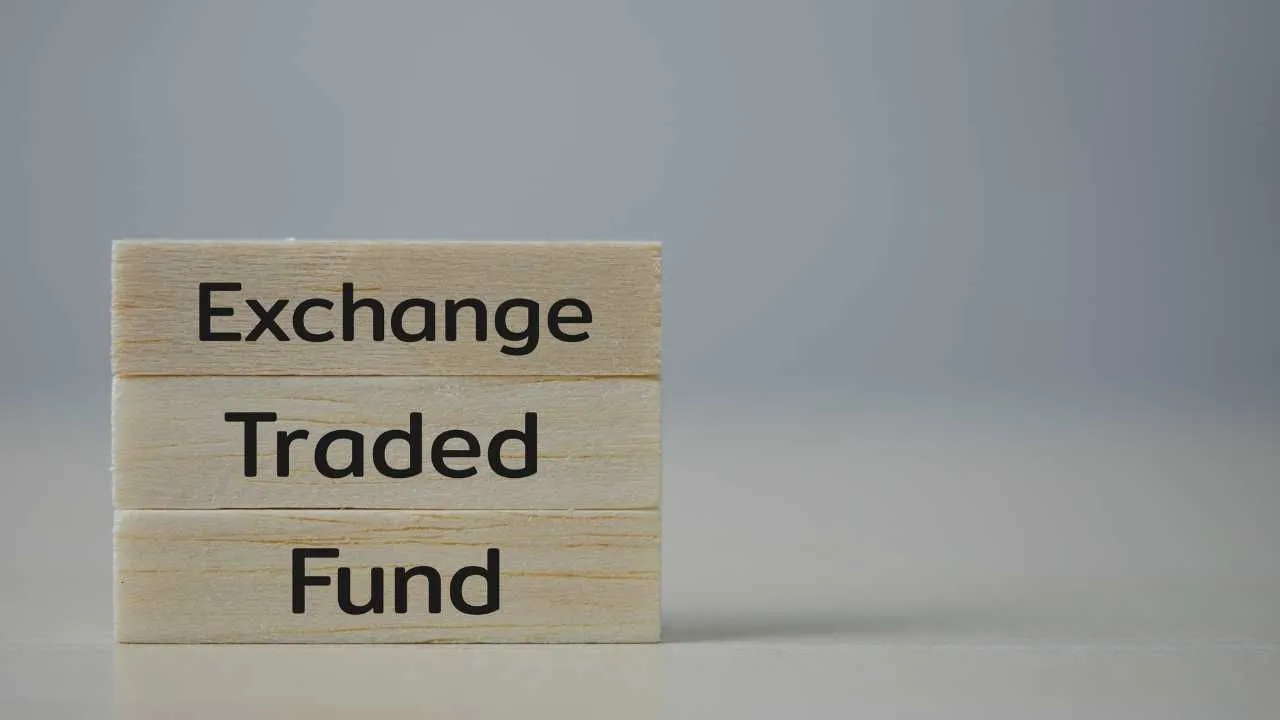 Stacked wooden blocks with Exchange Traded Fund written