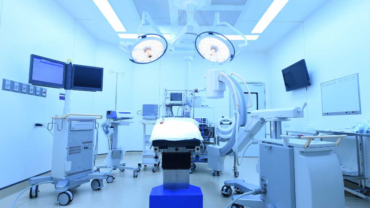 Modern operating room with advanced surgical equipment.