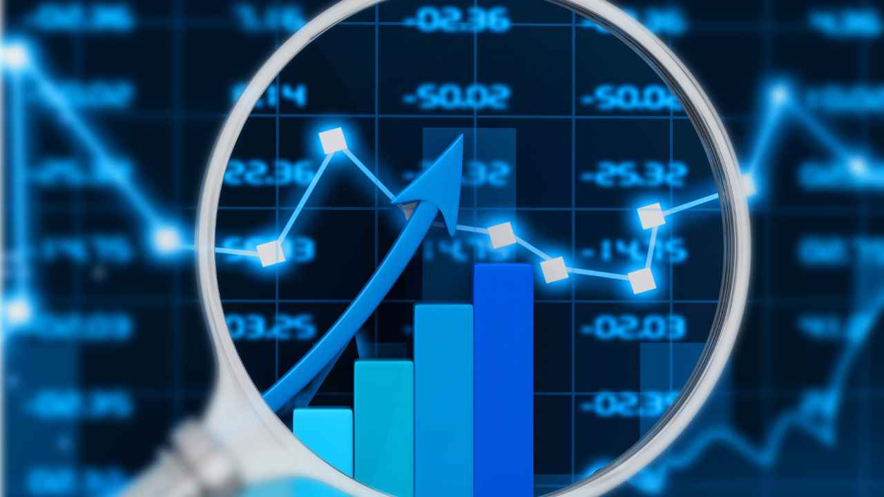 A magnifying glass looking at a graph