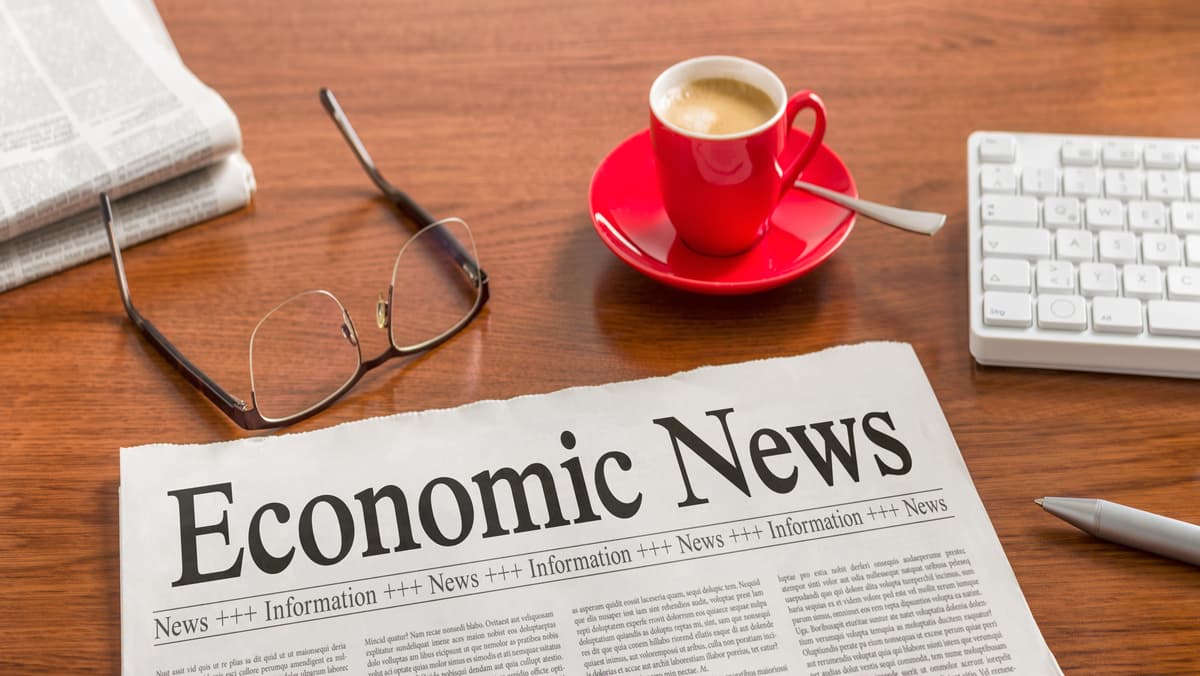 newspaper-on-wooden-desk-economic-news-width-1200-format-jpeg.jpg