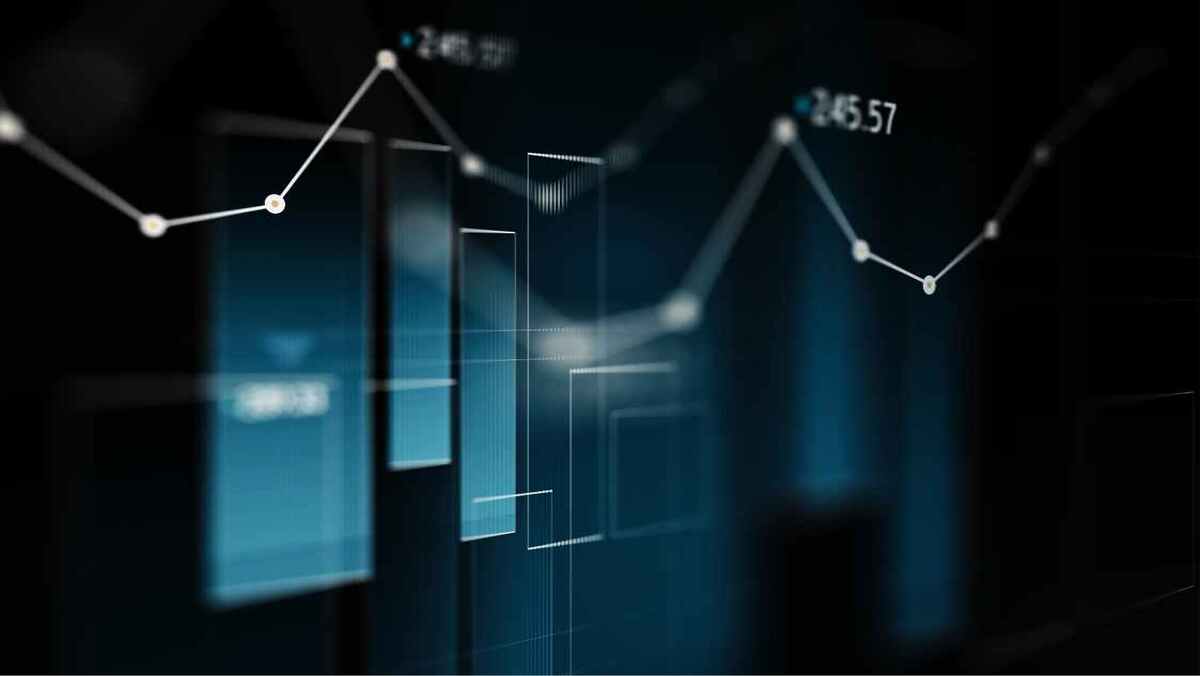 Digital stock market graph on a dark background depicting financial trends